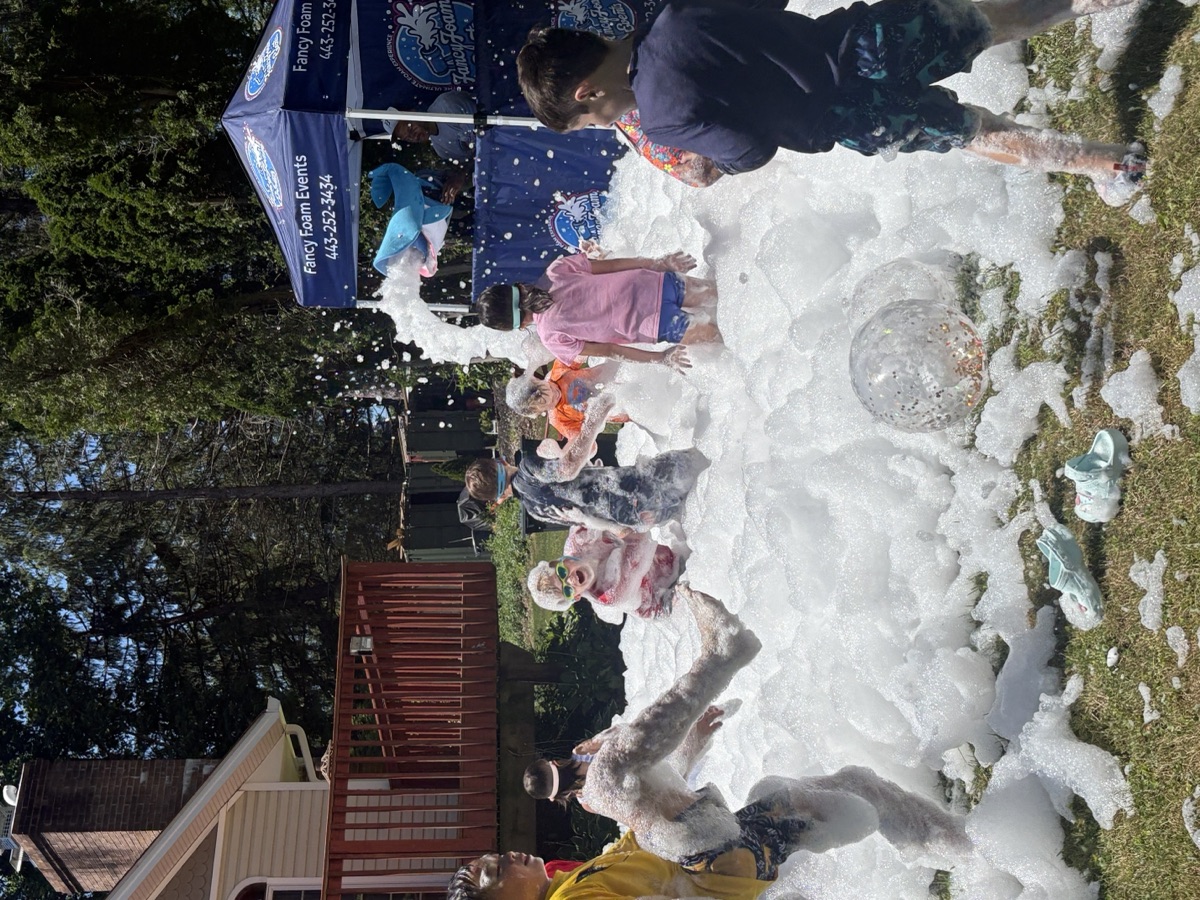 Kids playing in foam at Maryland birthday party by Fancy Foam Events